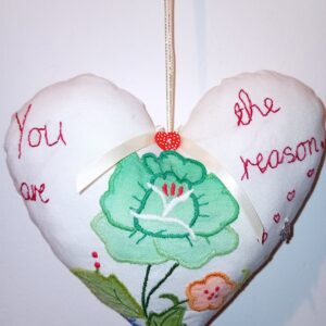 You are the reason - a hanging heart with a whimsical love note.
