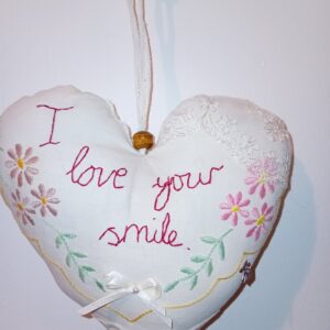 I love your smile - a hanging heart with a whimsical 'love note'