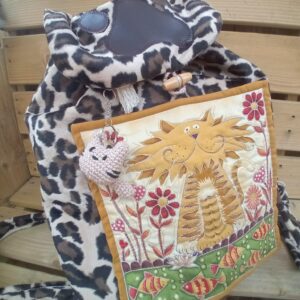 Wild Sister Backpack - One-of-a-kind feline duo